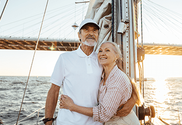 Senior couple on a sailboat out on the watere