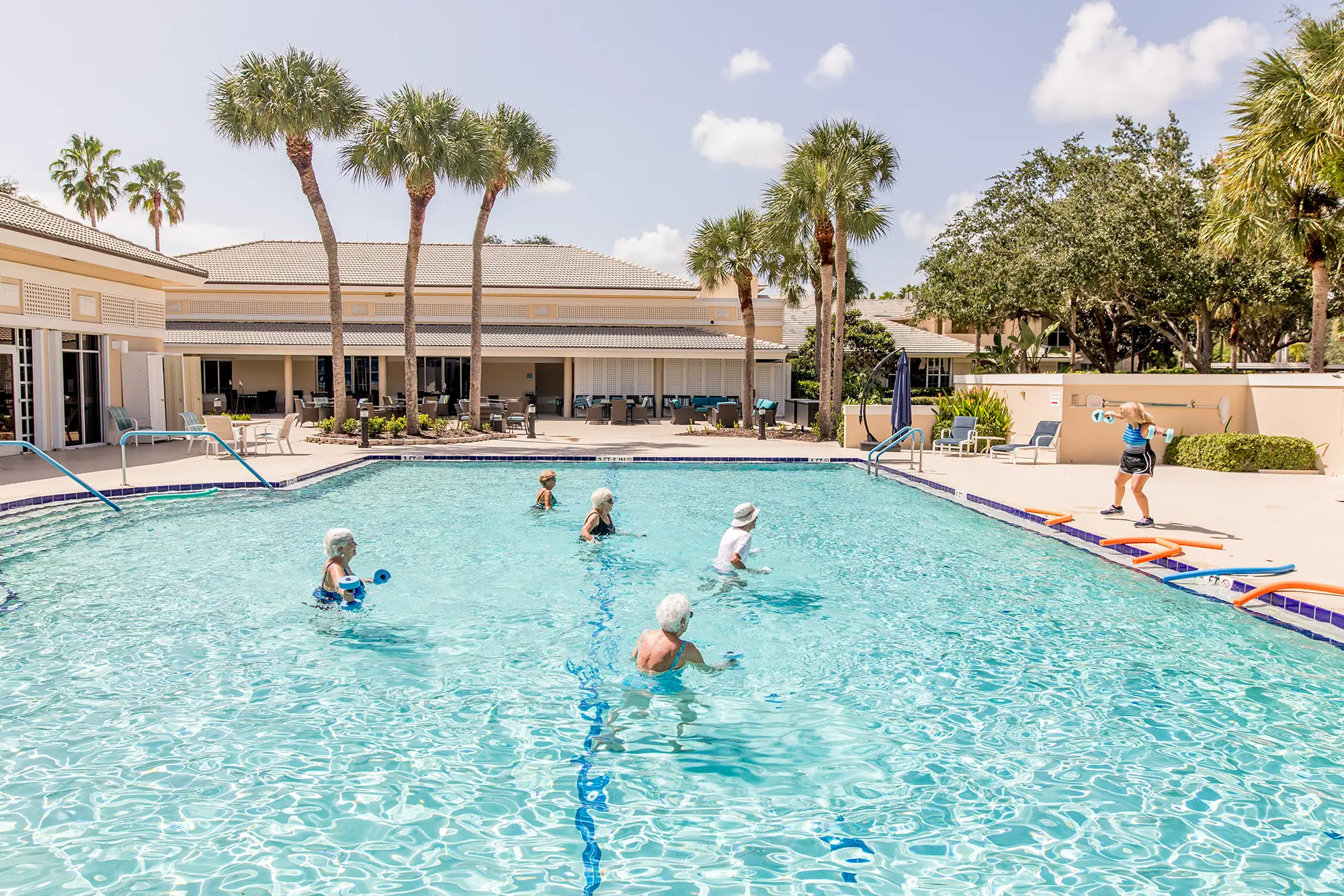 Group of seniors in the outdoor pool at Sandhill Cove