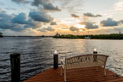 A bench on the dock near the retirement home 