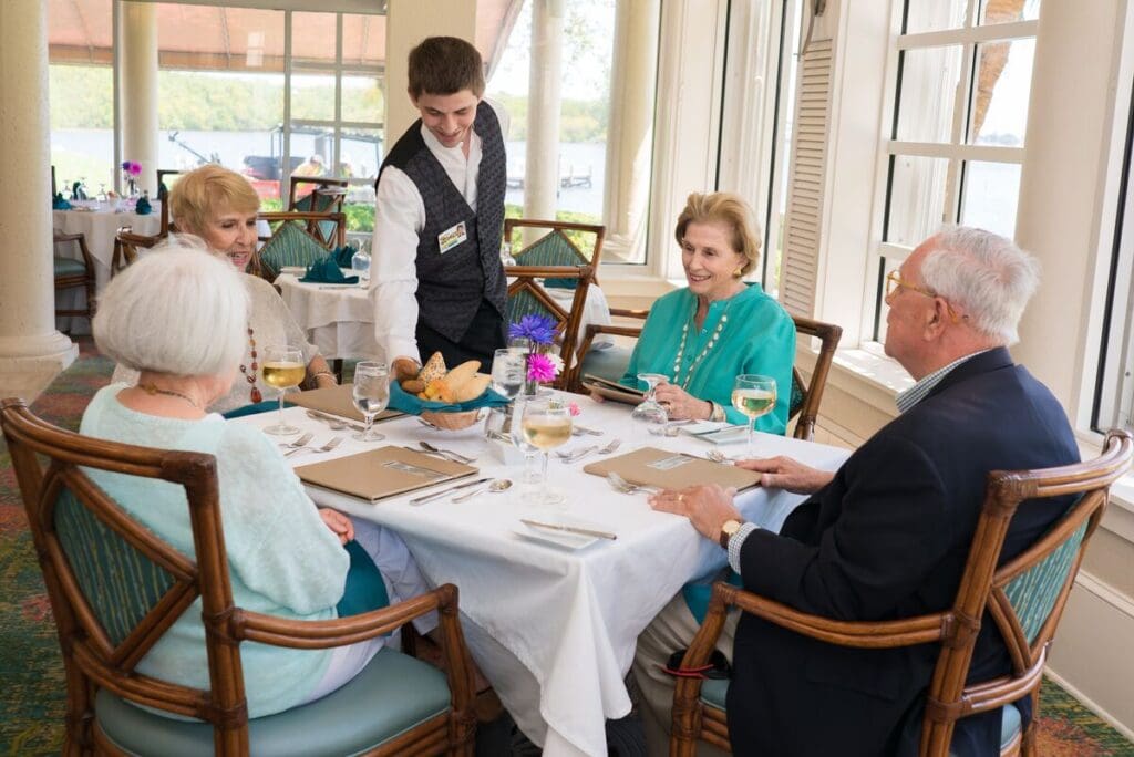Sandhill Cove residents enjoy dinner in the formal dining area 