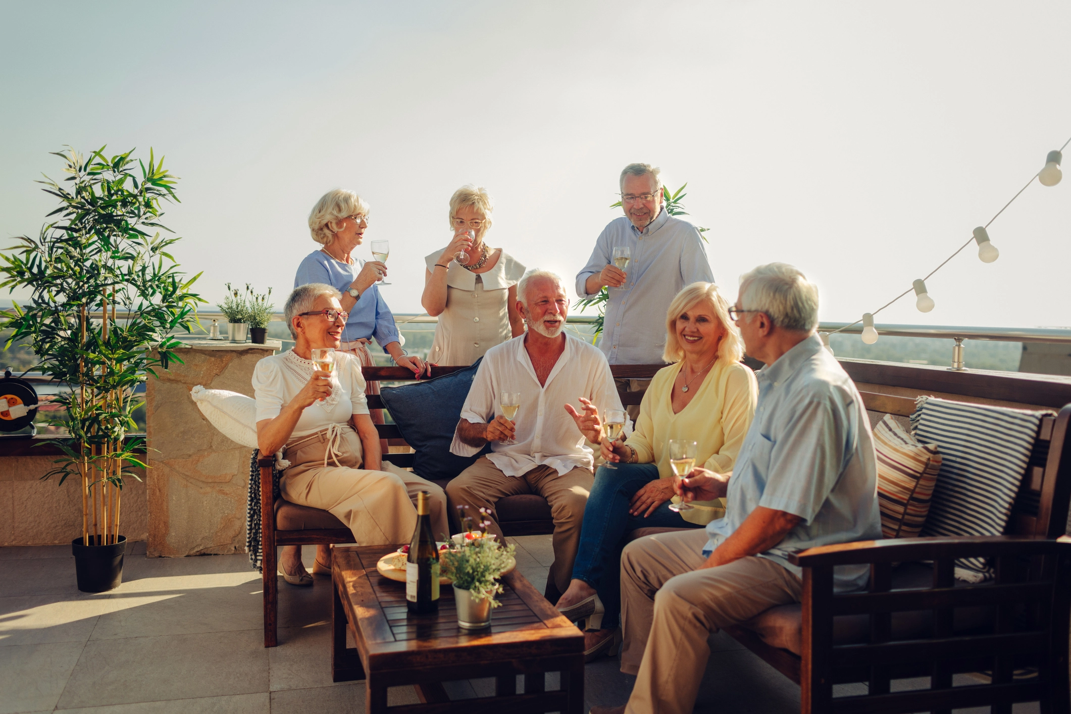 group of smiling seniors that represents wellness at Sandhill Cove in Palm City, Fl.