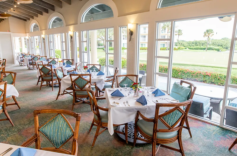 The common dining area at the retirement community with blue and brown furniture 