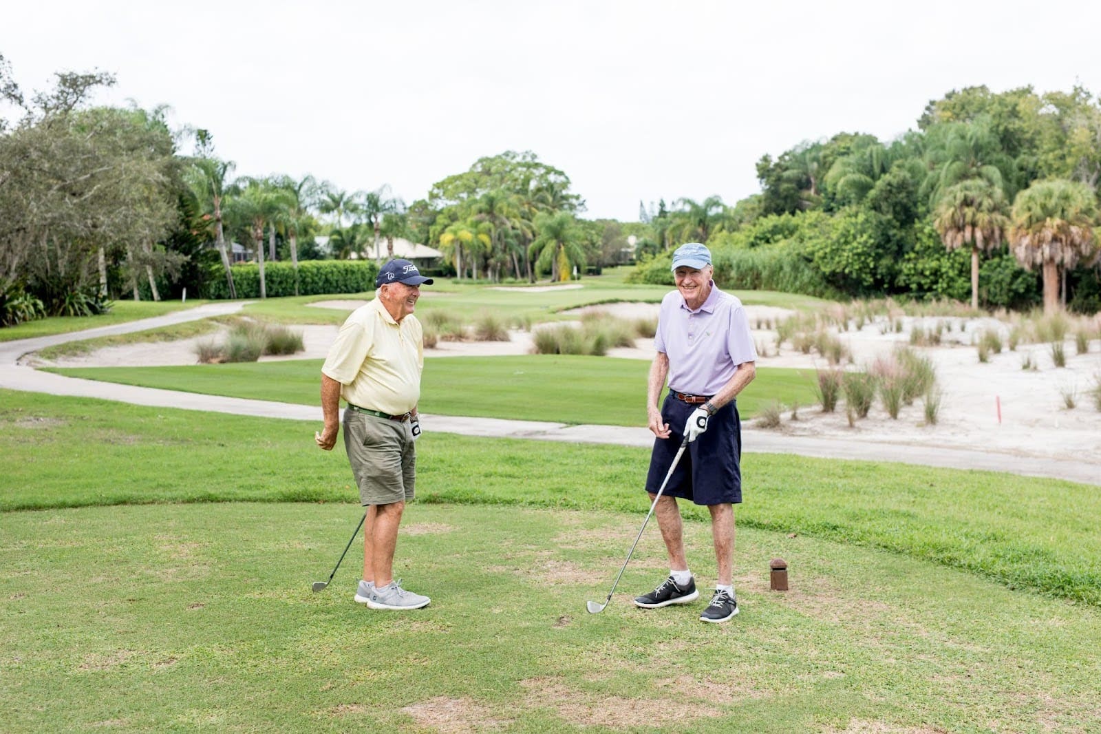 Senior men playing golf